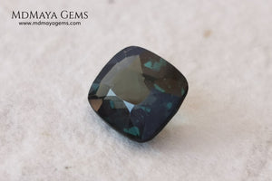 Rare Blue Green Spinel 1.86 ct, cushion cut. This natural and untreated gemstone has an antique cut, its green color is very rare, its size is ideal, neither too big nor too small. Its behavior under light is amazing, has a beautiful and bright color under day light and more green under incandescent light. It will look perfect in your custom jewelry. Spinels are gems with rising value.