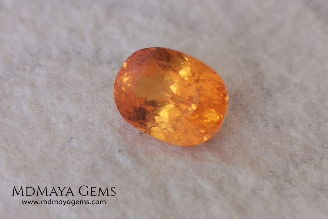  Fanta Unheated Spessartite Garnet. Oval Cut. 2.17 ct. This gemstone has a pure orange, without brown or reddish tones, it is rare for a gem to have such a pure color, and it is simply impressive. It has inclusions that do not affect the beauty of the gem at all. It will be incredibly beautiful mounted on any piece of jewelry, it will be the center of attention.