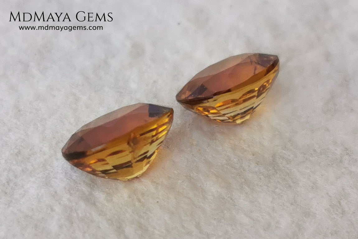Orange Tourmaline Pair 1.46 ct. Oval Cut. Rare gemstones with a beautiful honey color. There are not many orange gems, although it is the favorite color of many people and these look impressive mounted in jewelry. Natural and untreated precious stones at an affordable price.
