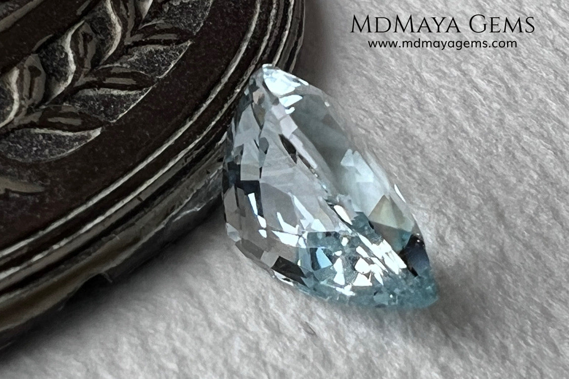 Attractive greenish blue aquamarine, fantastic color. Nice looking gem. Pear cut. 3.26 ct. 