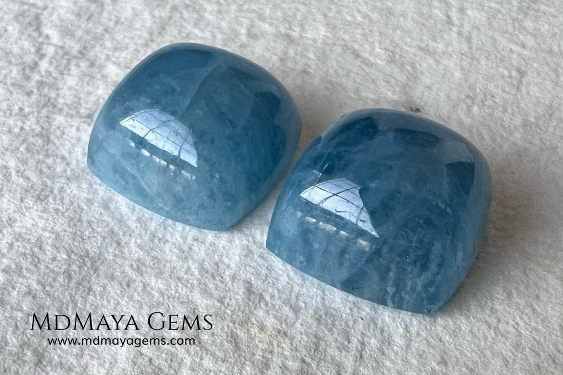 Pretty pair greenish blue Aquamarines. Square Cabochon Cut. Perfect set for to mount. 36.60 ct. We have an aquamarine that with these pieces would form a perfect set.