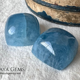Pretty pair greenish blue Aquamarines. Square Cabochon Cut. Perfect set for to mount. 36.60 ct. We have an aquamarine that with these pieces would form a perfect set.