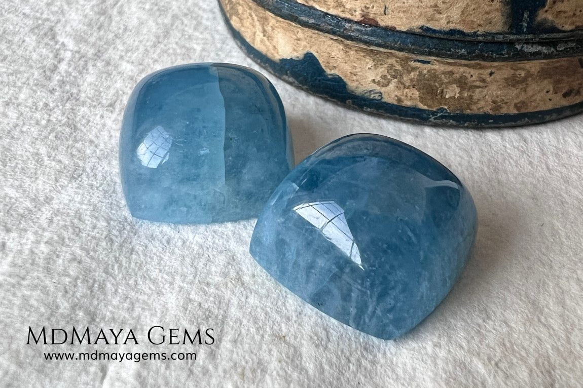 Pretty pair greenish blue Aquamarines. Square Cabochon Cut. Perfect set for to mount. 36.60 ct. We have an aquamarine that with these pieces would form a perfect set.
