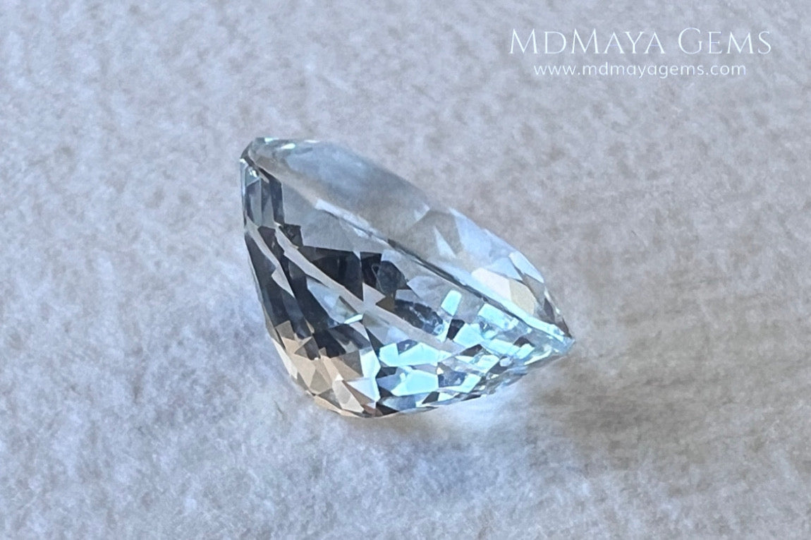 Beautiful aquamarine 2.17 ct. oval cut, this gemstone is almost colorless although it has a subtle bluish tint that together with its brightness and good quality of cut and clarity make it ideal for your personalized jewelry. It will be really pretty  mounted in silver or gold. A natural gemstone within reach of any pocket.