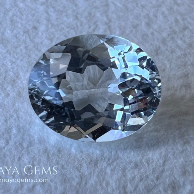 Beautiful aquamarine 2.17 ct. oval cut, this gemstone is almost colorless although it has a subtle bluish tint that together with its brightness and good quality of cut and clarity make it ideal for your personalized jewelry. It will be really pretty  mounted in silver or gold. A natural gemstone within reach of any pocket.