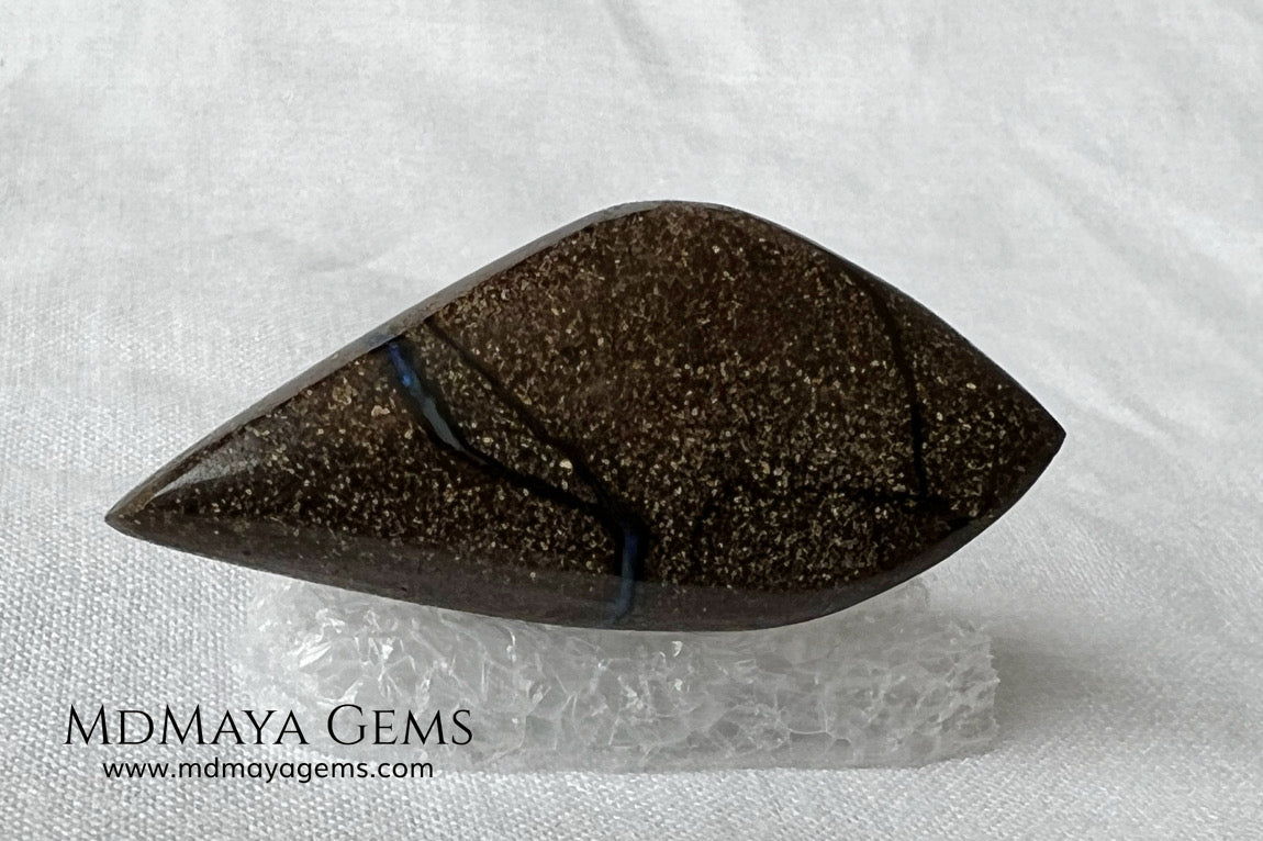 Stunning Boulder Opal 25.14 ct. from Australia. Cabochon Cut. Free Form. Imagine an island surrounded by deep blue-green waters, that's what this opal is.