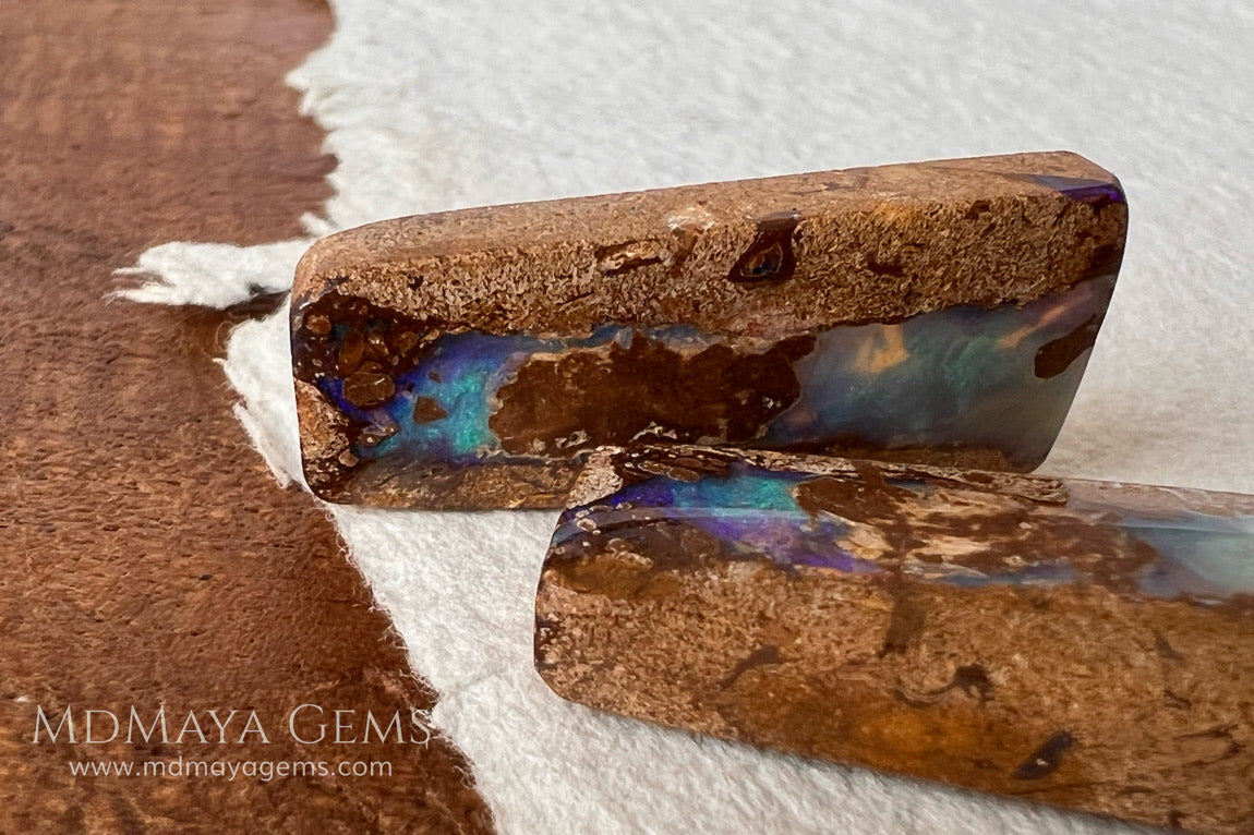 Australian Boulder Wood Fossil Opal Pair. Cabochon Cut 31.07 ct total.