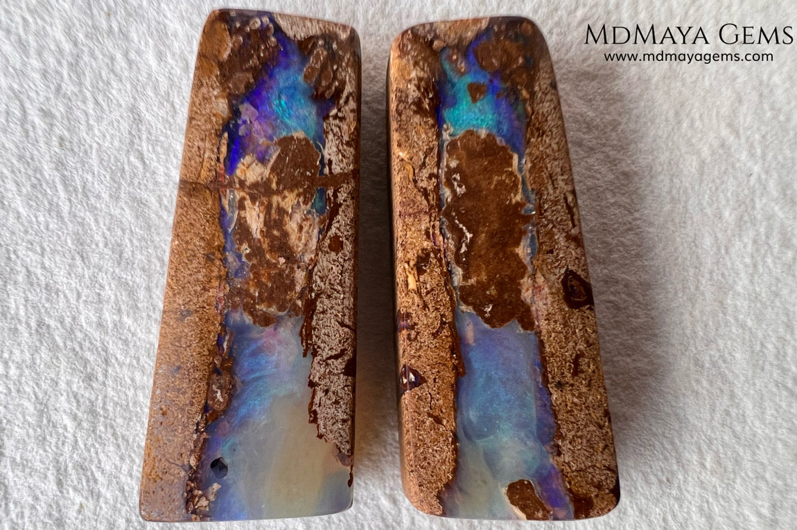 Australian Boulder Wood Fossil Opal Pair. Cabochon Cut 31.07 ct total.