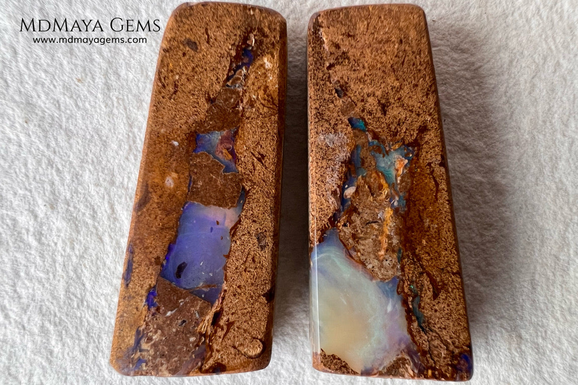 Australian Boulder Wood Fossil Opal Pair. Cabochon Cut 31.07 ct total.