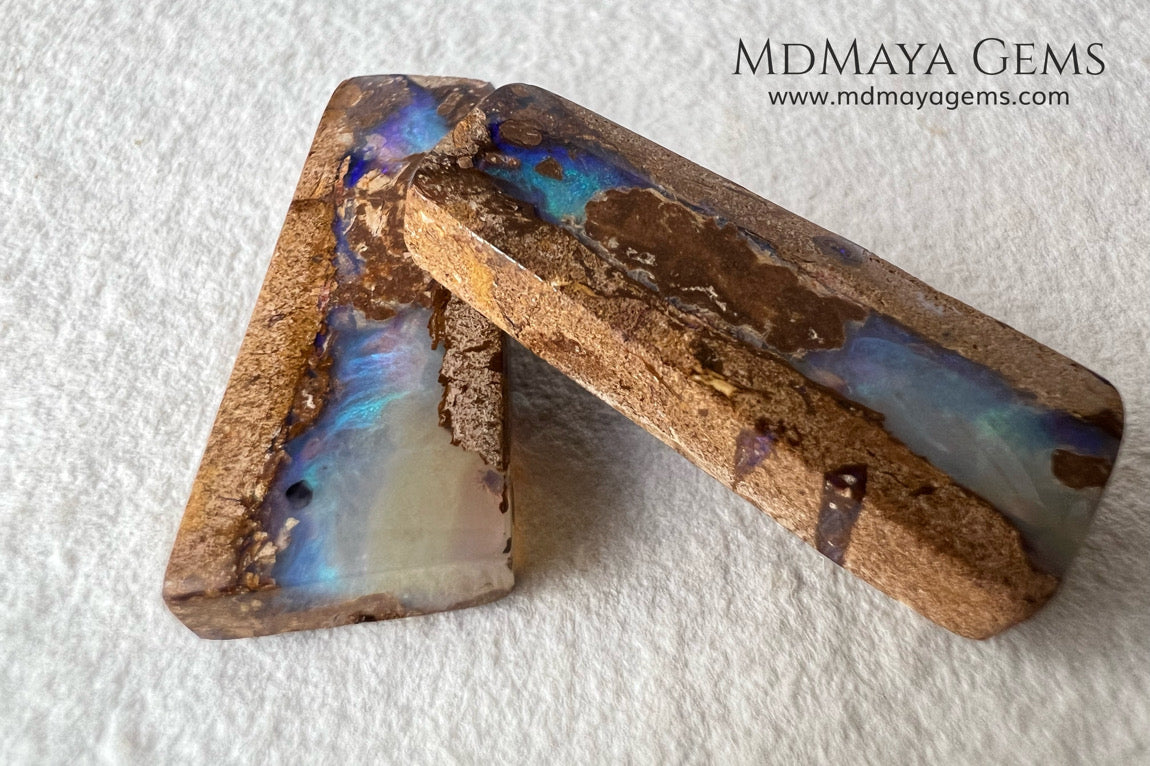 Australian Boulder Wood Fossil Opal Pair. Cabochon Cut 31.07 ct total.
