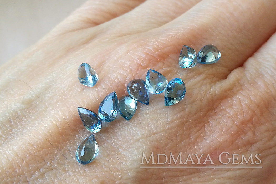 Blue Africana Aquamarine. 10 pieces. Pear cut. 3.86 ct total.