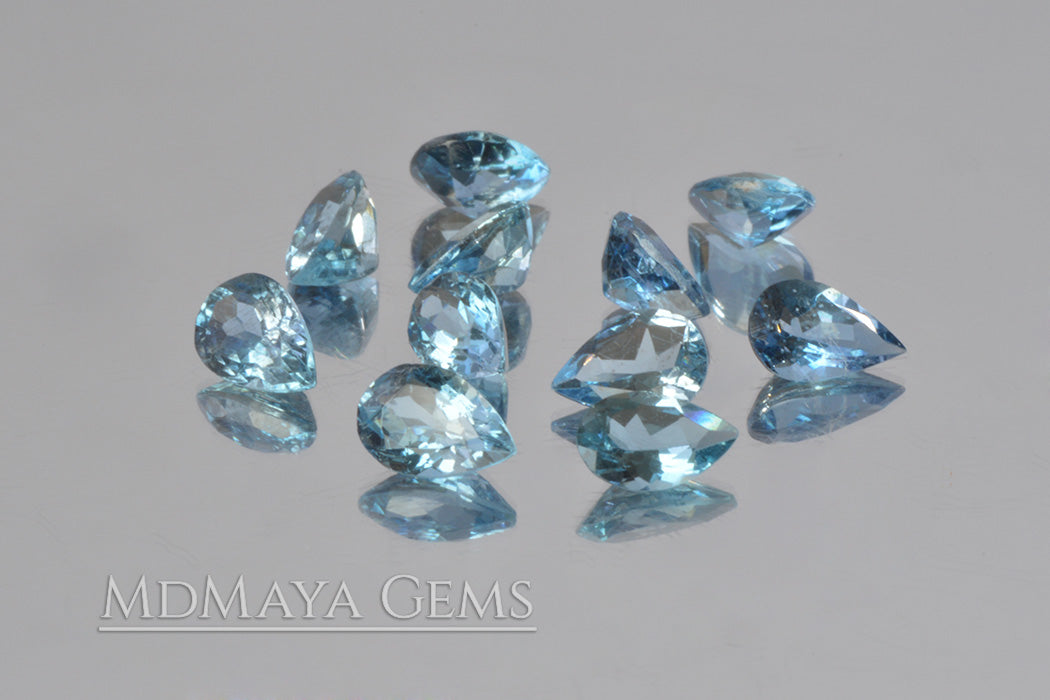 Blue Africana Aquamarine. 10 pieces. Pear cut. 3.86 ct total.