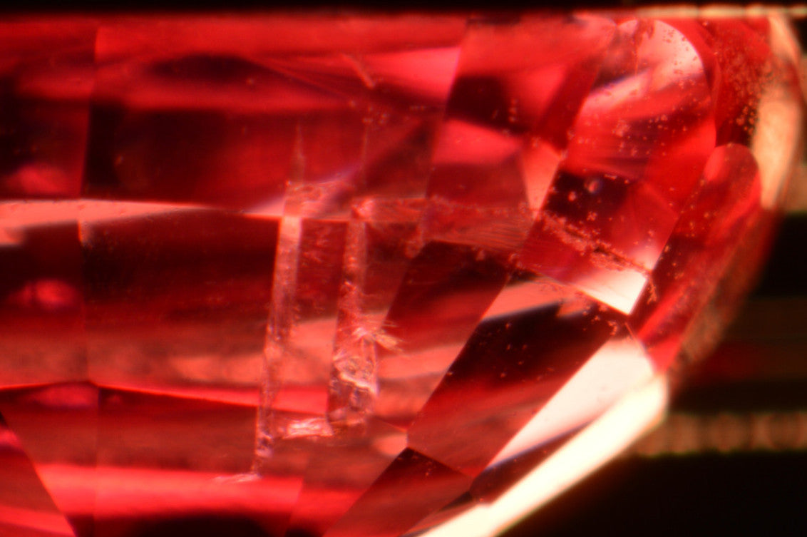 Inclusion in Neon Vivid Candy Pink Spinel from Tanzania. Cushion Cut. MdMaya Gems