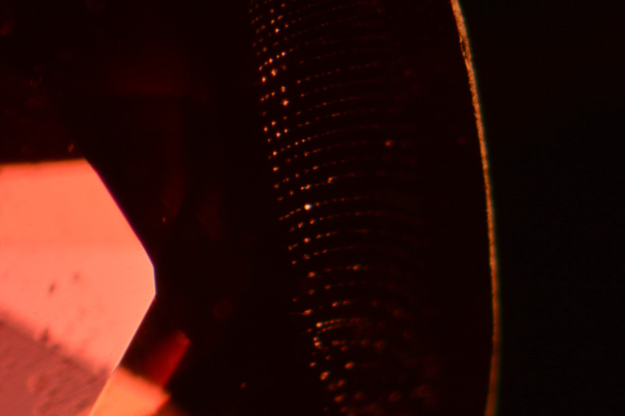 Inclusion in red spinel gemstone