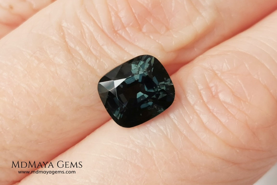 Gorgeous greenish gray spinel, 3.13 ct, cushion cut. This natural and untreated gemstone has an antique cut, its size is ideal, neither too big nor too small. Its behaviour under light is amazing, has a beautiful color under incandescent light, and contains a small treasure inside, another small spinel fully formed, a delight both outside and inside. Mother nature is perfect. It will be ideal in any jewel that you want to personalize. Spinels are gems with rising value.