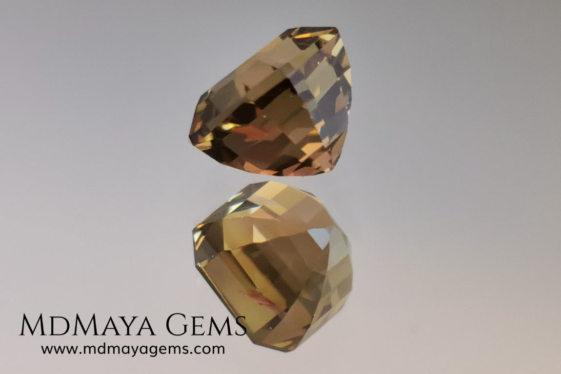 Rose Gold Bicolor tourmaline. Asscher cut 2.62 ct.  Bicolor tourmaline, whose two colors are a greenish yellow and a reddish pink. Once the light falls on the crown of the gem, these colors mix, resulting in a very elegant and saturated golden copper. Thanks to its color, its good cut quality and proportions, it will be an exceptional gem to mount on any type of jewel.