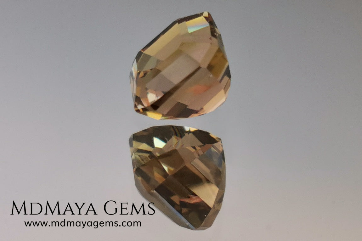 Rose Gold Bicolor tourmaline. Asscher cut 2.62 ct.  Bicolor tourmaline, whose two colors are a greenish yellow and a reddish pink. Once the light falls on the crown of the gem, these colors mix, resulting in a very elegant and saturated golden copper. Thanks to its color, its good cut quality and proportions, it will be an exceptional gem to mount on any type of jewel.