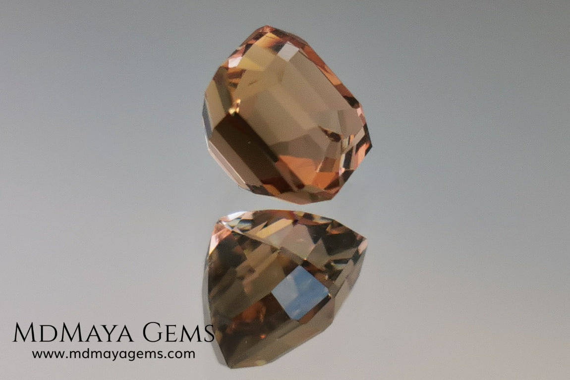 Rose Gold Bicolor tourmaline. Asscher cut 2.62 ct.  Bicolor tourmaline, whose two colors are a greenish yellow and a reddish pink. Once the light falls on the crown of the gem, these colors mix, resulting in a very elegant and saturated golden copper. Thanks to its color, its good cut quality and proportions, it will be an exceptional gem to mount on any type of jewel.