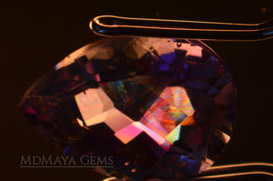 Interference figures in Untreated Amethyst from Brazil 5.35 ct, checkerboard pear cut