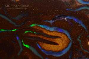 Top Koroit Boulder Opal 15.23 ct under microscope