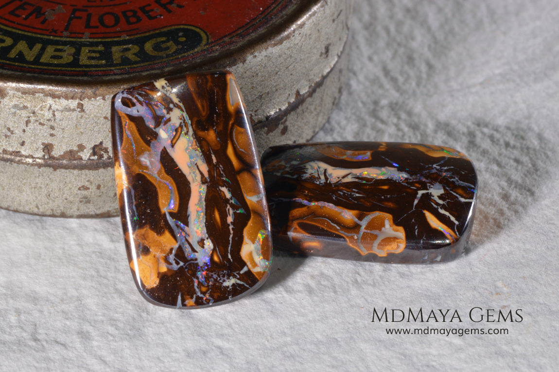 Boulder Opal Pair from Australia. Cabochon Cut. 36.57 ct total.