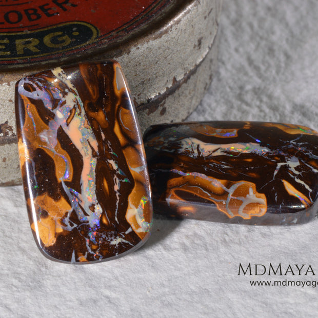 Boulder Opal Pair from Australia. Cabochon Cut. 36.57 ct total.