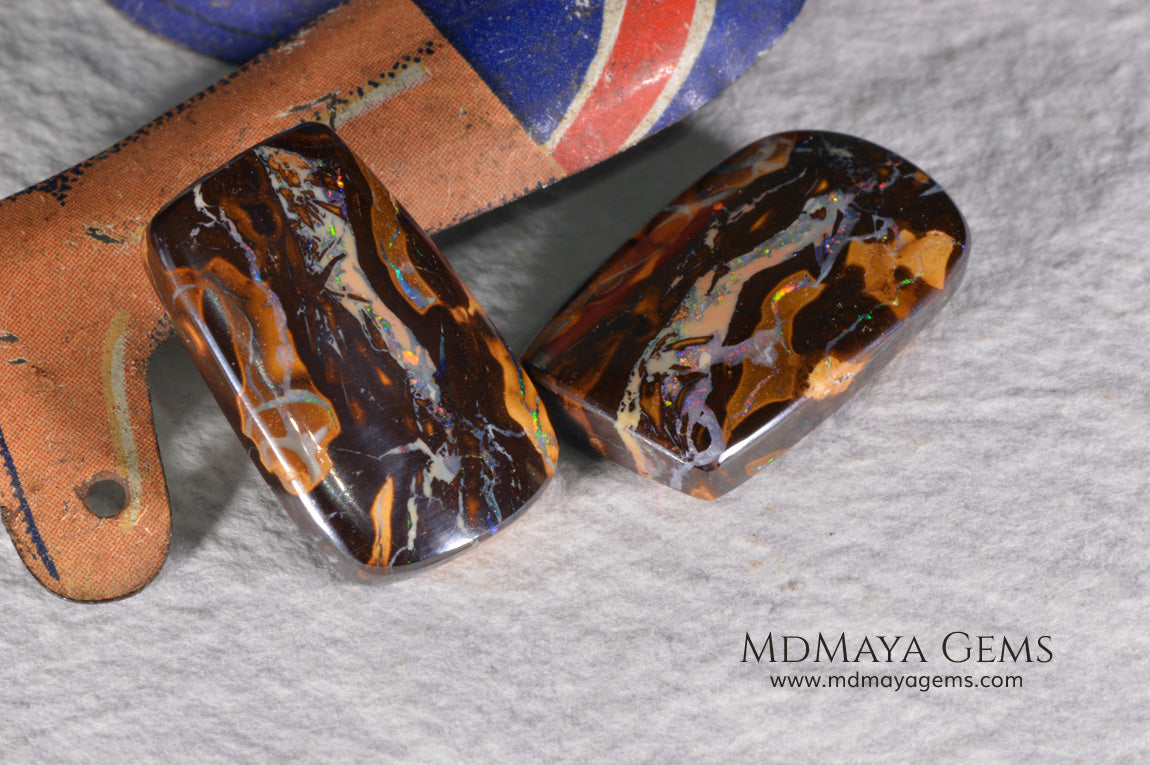 Boulder Opal Pair from Australia. Cabochon Cut. 36.57 ct total.