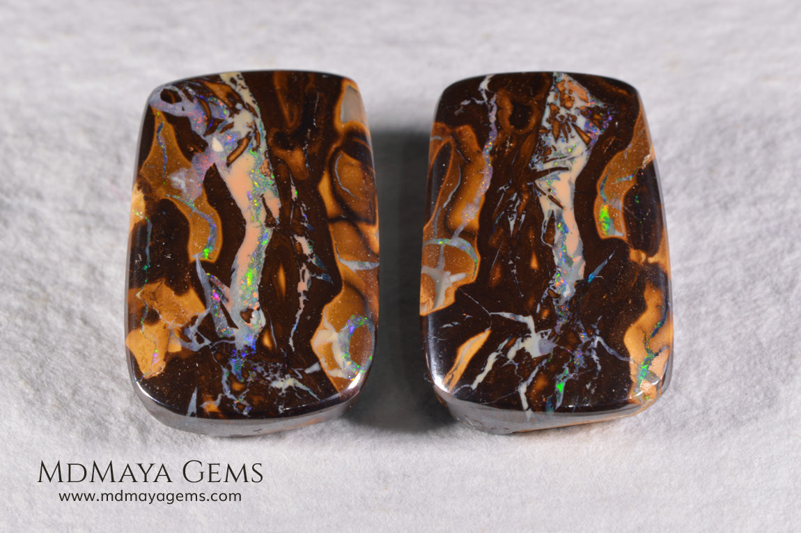 Boulder Opal Pair from Australia. Cabochon Cut. 36.57 ct total.