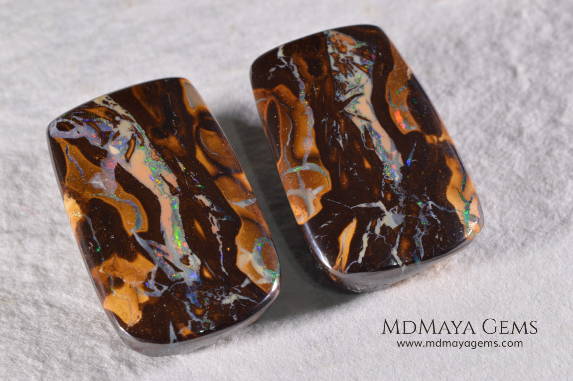 Boulder Opal Pair from Australia. Cabochon Cut. 36.57 ct total.