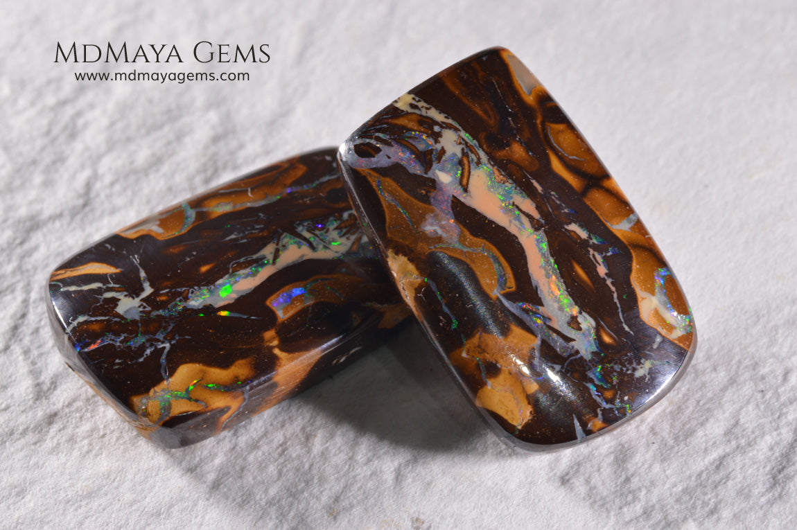 Boulder Opal Pair from Australia. Cabochon Cut. 36.57 ct total.