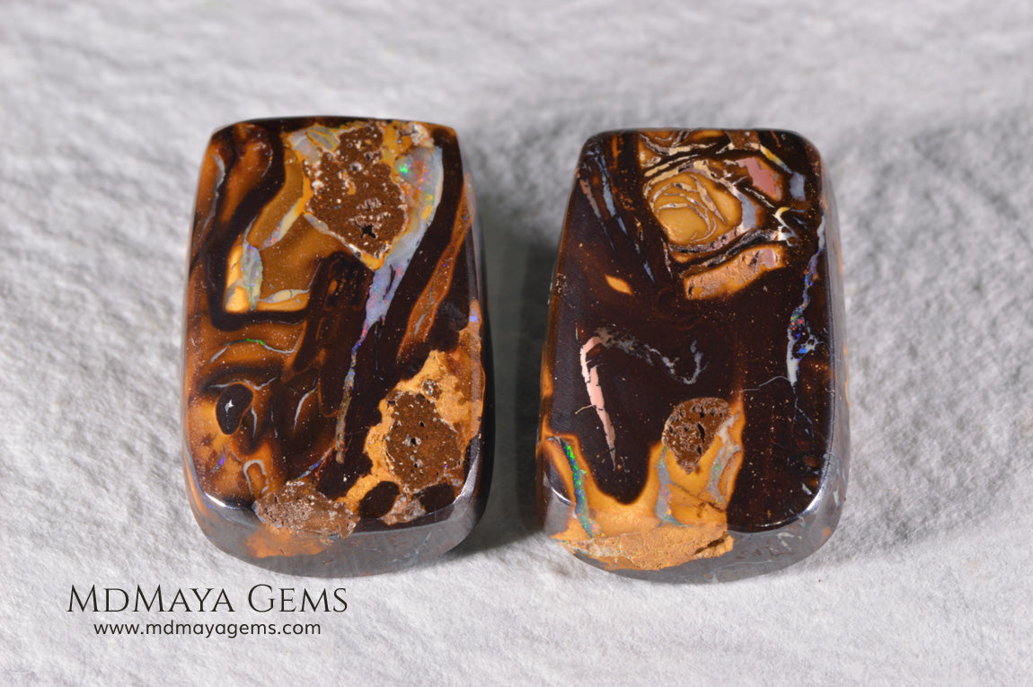 Boulder Opal Pair from Australia. Cabochon Cut. 36.57 ct total.