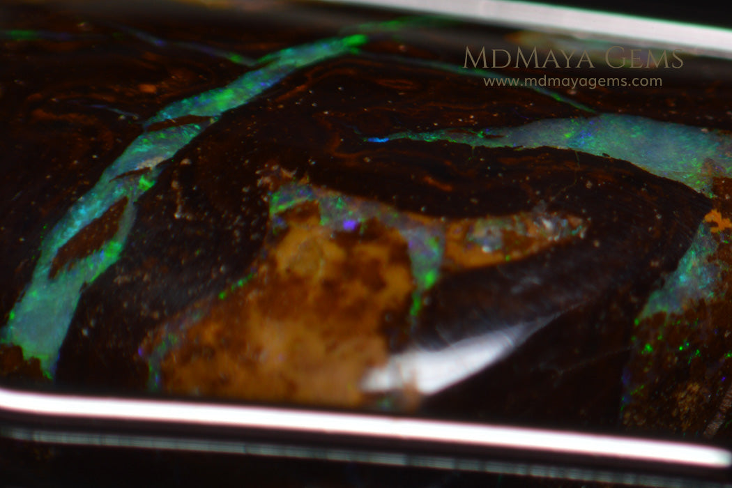 Yowah Boulder Opal 6.65 ct from Australia under microscope