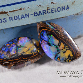  Australian Boulder Wood Fossil Opal Pair. Cabochon Oval Cut. 10.45 ct. 