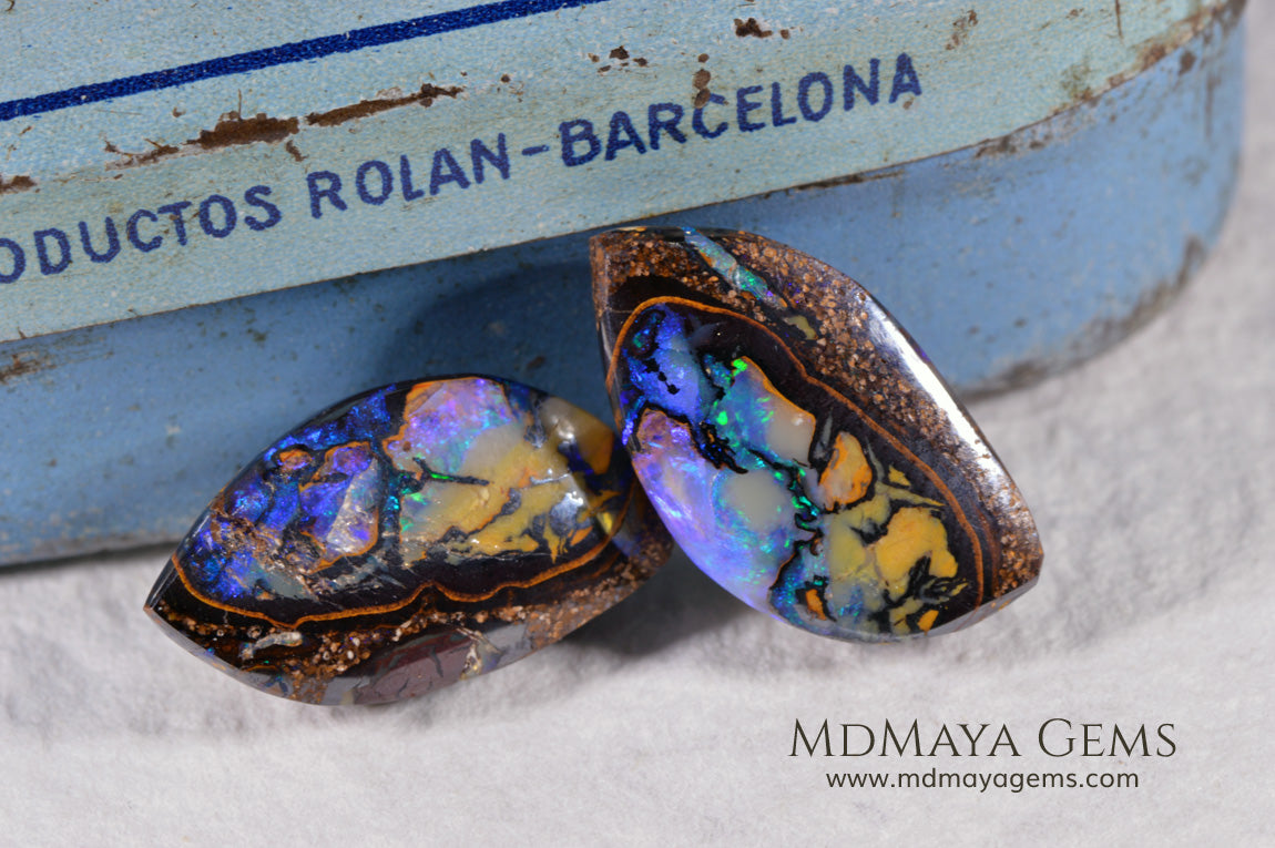  Australian Boulder Wood Fossil Opal Pair. Cabochon Oval Cut. 10.45 ct. 