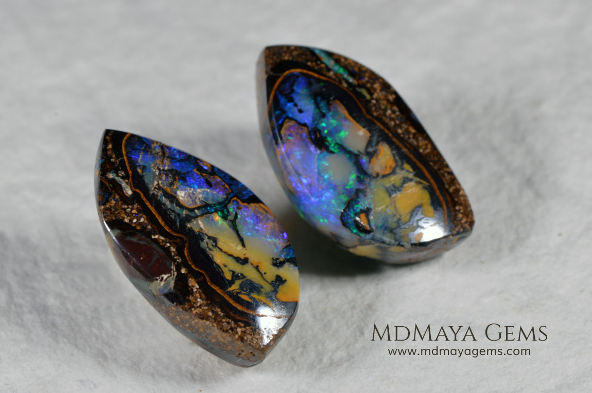 Australian Boulder Wood Fossil Opal Pair. Cabochon Oval Cut. 10.45 ct. 