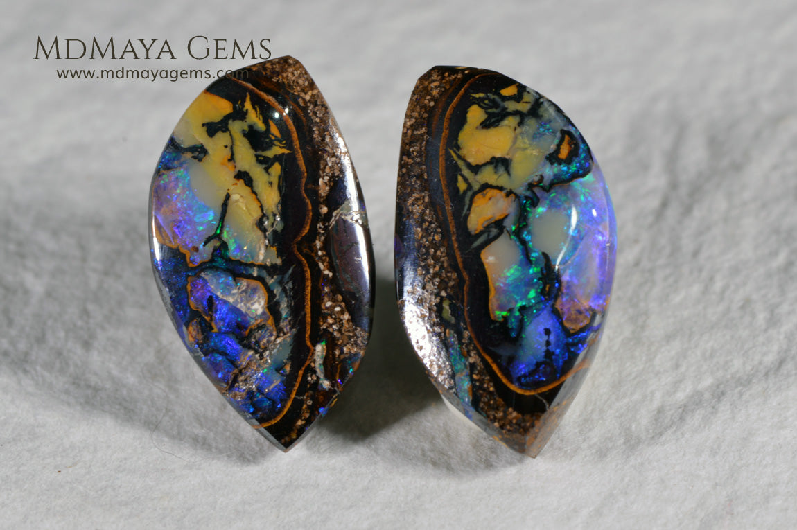  Australian Boulder Wood Fossil Opal Pair. Cabochon Oval Cut. 10.45 ct. 