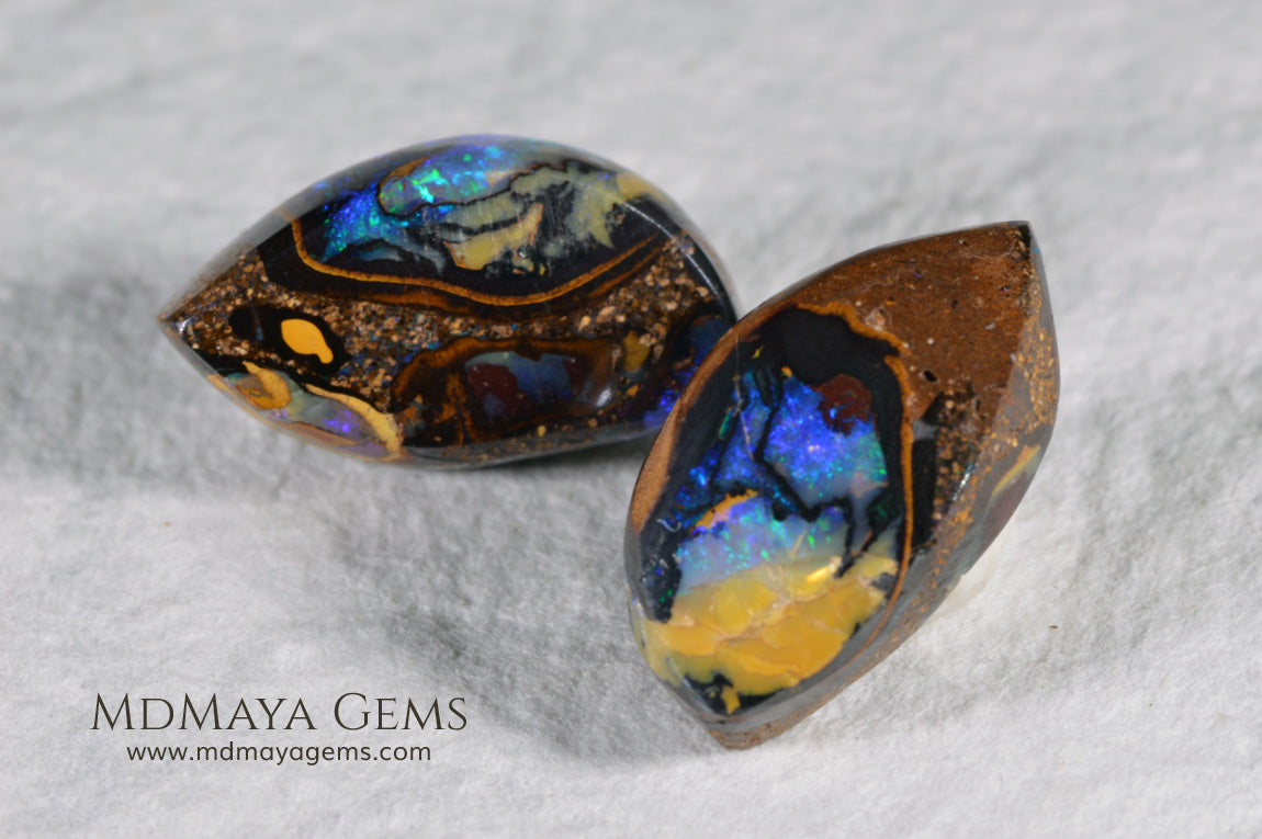  Australian Boulder Wood Fossil Opal Pair. Cabochon Oval Cut. 10.45 ct. 