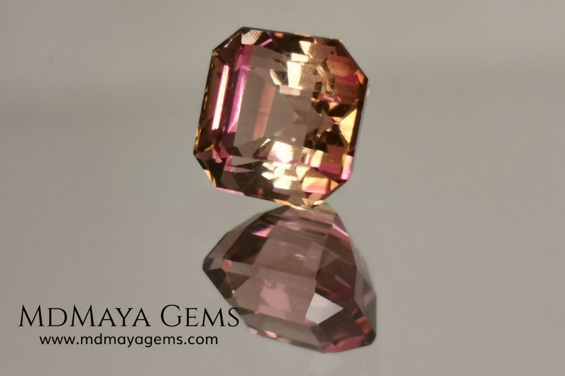 Bicolor, pink and gold tourmaline. Asscher cut. 2.21 ct.  This incredible natural gem has two colors, golden yellow and pink. Both colors coexist mixed, and once the light falls on it it is difficult to separate them; the mix is elegant and luxurious. Great cutting quality. Without a doubt it will be incredible in any piece of jewelry.