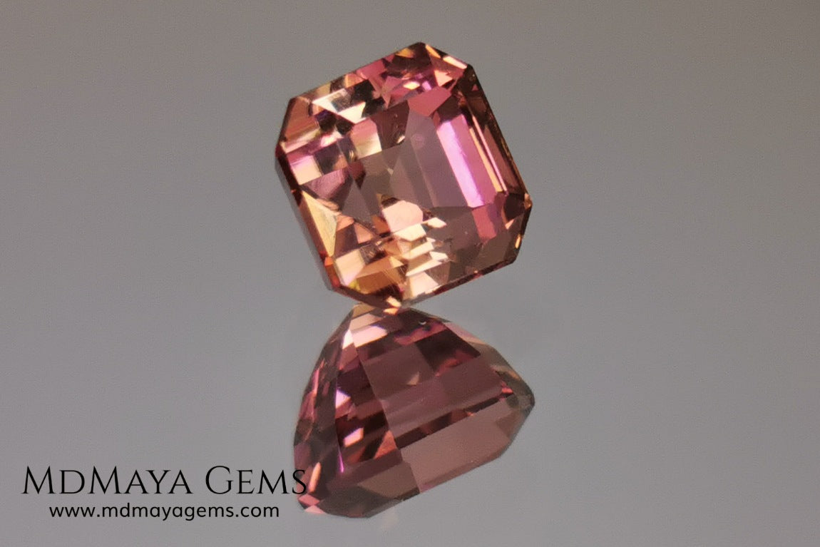 Bicolor, pink and gold tourmaline. Asscher cut. 2.21 ct.  This incredible natural gem has two colors, golden yellow and pink. Both colors coexist mixed, and once the light falls on it it is difficult to separate them; the mix is elegant and luxurious. Great cutting quality. Without a doubt it will be incredible in any piece of jewelry.