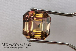Bicolor, pink and gold tourmaline. Asscher cut. 2.21 ct.  This incredible natural gem has two colors, golden yellow and pink. Both colors coexist mixed, and once the light falls on it it is difficult to separate them; the mix is elegant and luxurious. Great cutting quality. Without a doubt it will be incredible in any piece of jewelry.