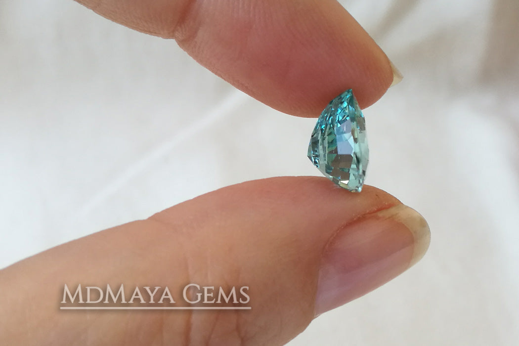 Attractive greenish Blue Aquamarine. Pear cut. 3.51 ct under daylight