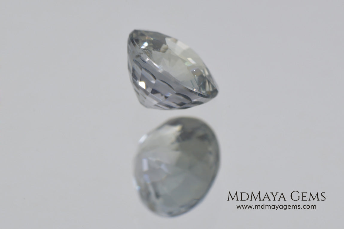 Unheated white sapphire 1.00 ct. Round cut.