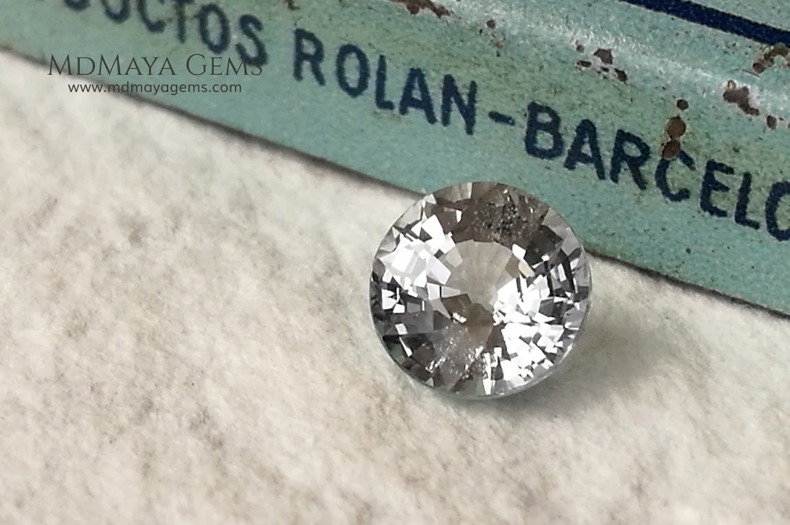 Unheated white sapphire 1.00 ct. Round cut.