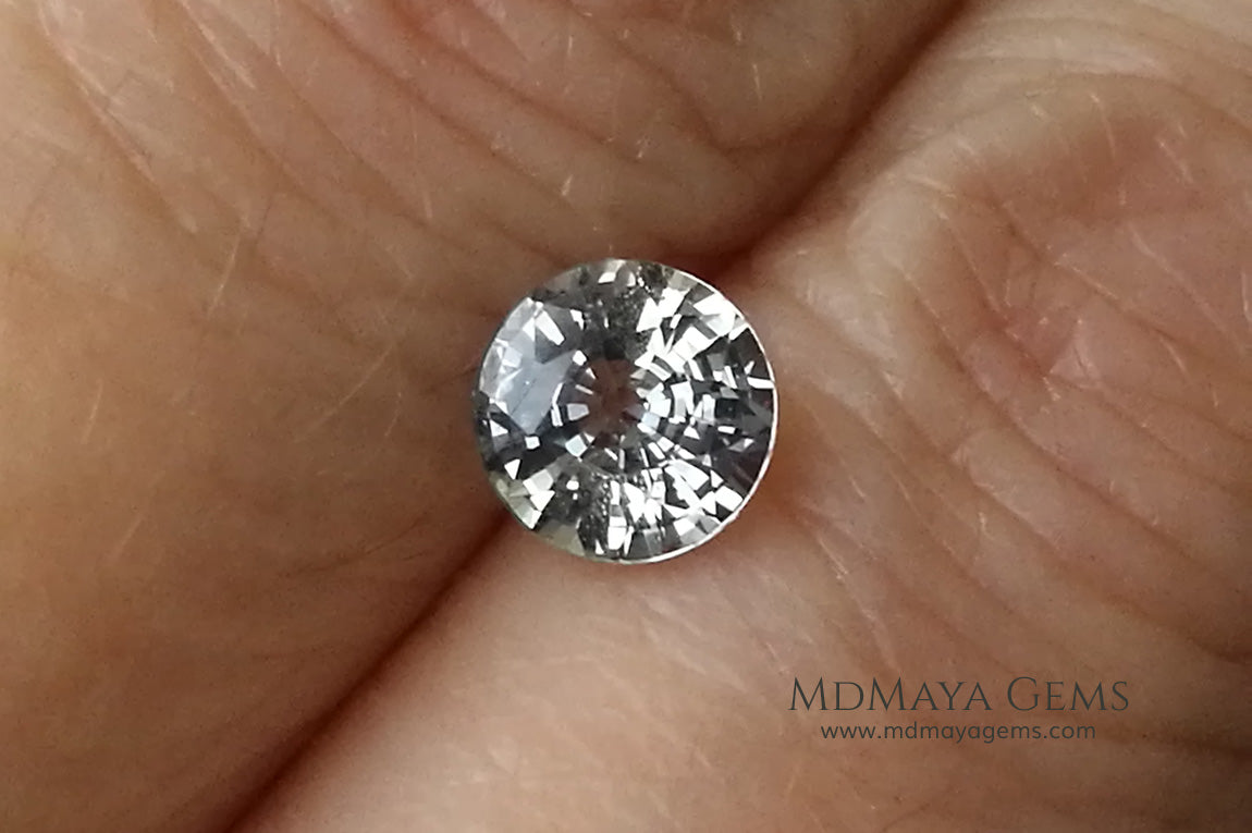 Unheated white sapphire 1.00 ct. Round cut.