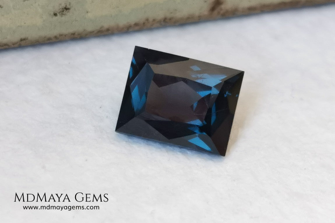  Affordable Blue Grey Spinel Gemstone. Rectangle Cut. 2.14 ct. Maximum brilliance. This gem has a beautiful behavior under any type of light, it has a dark blue color full of bright sparkles. Inclusions visible only under the lens.  Beautiful gemstone for your personalized jewelry.