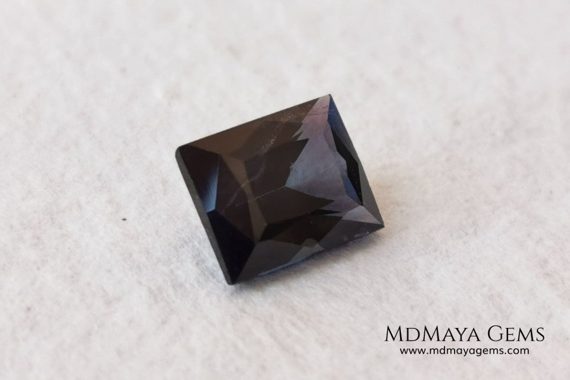  Affordable Blue Grey Spinel Gemstone. Rectangle Cut. 2.14 ct. Maximum brilliance. This gem has a beautiful behavior under any type of light, it has a dark blue color full of bright sparkles. Inclusions visible only under the lens.  Beautiful gemstone for your personalized jewelry.