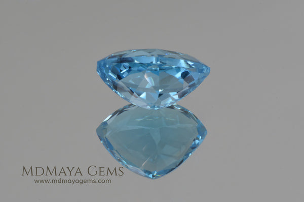 100% handmade blue topaz fantasy fashion cut/topaz carving for jewelry making.Blue topaz carving. Weight 14.25 carat approx: 16.2x18.5x10mm approx