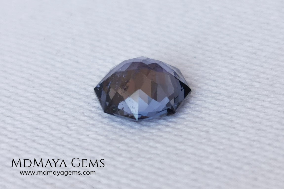 Pretty bluish violet spinel 1.45 ct, octagon cut. This small spinel has a bit of a window, but thanks to its cut it has a good reflection of light on its facets, making it not boring at all. A small natural beauty and without any treatment within reach of all pockets. It will look spectacular once mounted on a ring.