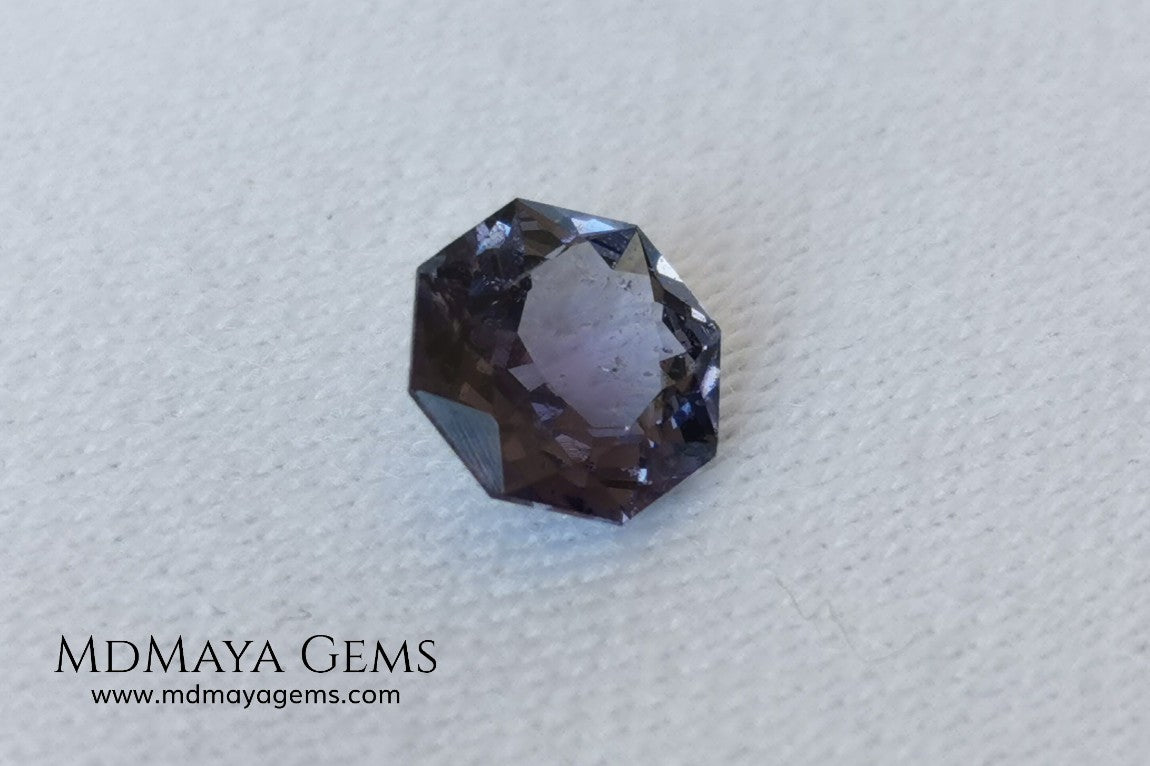 Pretty bluish violet spinel 1.45 ct, octagon cut. This small spinel has a bit of a window, but thanks to its cut it has a good reflection of light on its facets, making it not boring at all. A small natural beauty and without any treatment within reach of all pockets. It will look spectacular once mounted on a ring.