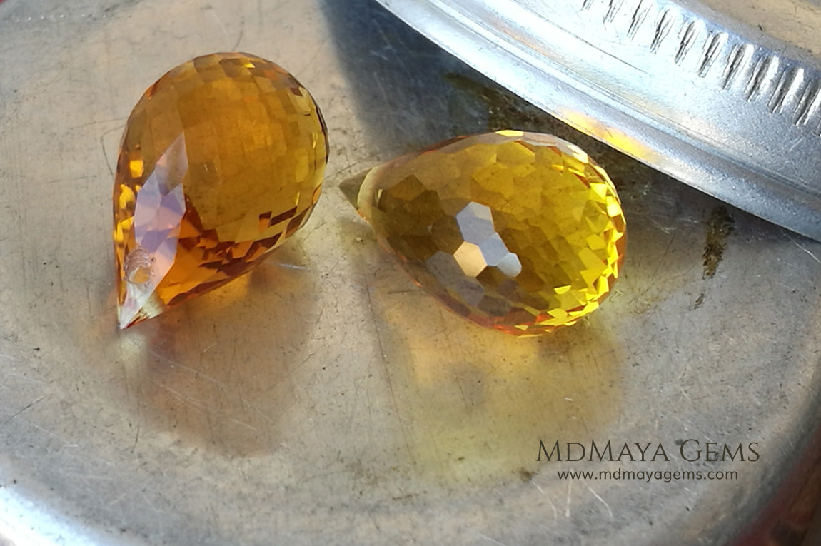 Vibrant orangy yellow citrine pair 9.98 ct